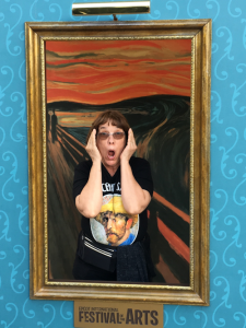 Linda Barnicott, Pittsburgh's Painter of Memories, poses in a reproduction of Edvard Munch's "The Scream."