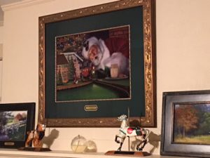 This photo features Linda Barnicott's painting "All Aboard with Santa."